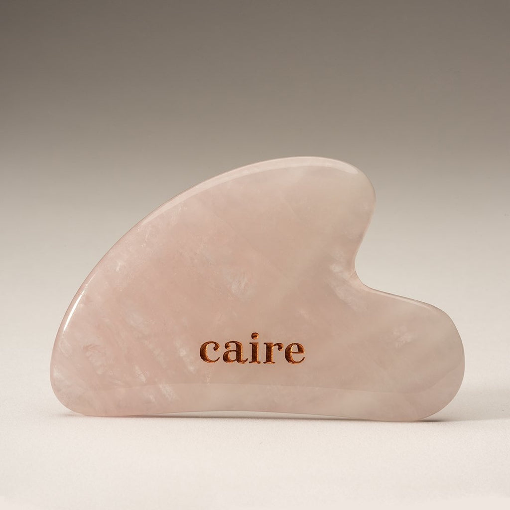 https://www.cairebeauty.com/cdn/shop/products/gua-sha-facial-ritual-smoothing-stone-495222_1024x1024.jpg?v=1660629928